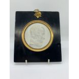 A framed porcelain miniature of Alexandre Brongniart 1800-1897 modelled by David D'Anger modeller at