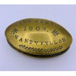 A brass engraved snuff box by John James 1903