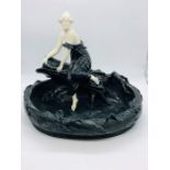 A Black large porcelain bowl with seated lady in Art Deco style AF