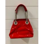 Russell and Bromley small red pattern bag with chain handles