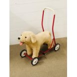 A Mulholland and Bailie Labrador dog baby walker on wheels