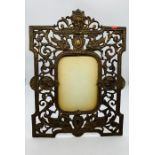 A large cast metal photo frame with Greek theme