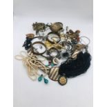 A volume of costume jewellery