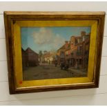 A 19th Century Oil on Board of an English Street Scene signed T Rowe.