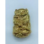 A gold plated vesta case in the form of a cat and a rat