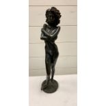 A standing Bronze of a lady signed and dated '98.