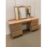 A lime oak dressing table and mirror