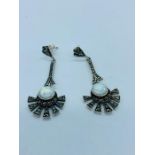 A pair of silver marcasite and opal panelled drop earrings