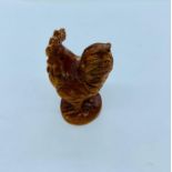 A Japanese boxwood netsuke figure of a Rooster signed