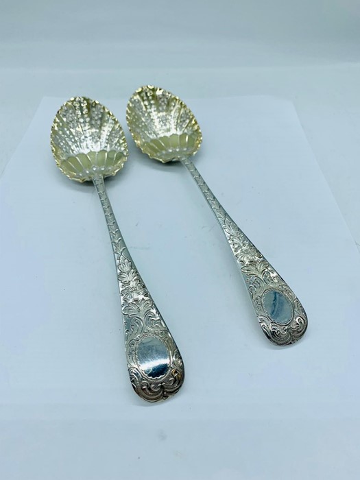 A Pair of decorated silver spoons, hallmarked 1893-94 Sheffield, makers mark HA - Image 2 of 3