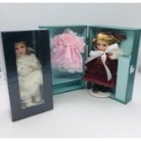 Two Victorian dolls still boxed