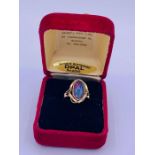An Australian Opal ring set in 9ct gold.