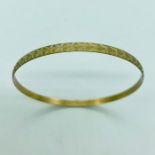 A 9ct gold bangle (5.5g)