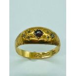 An 18ct yellow gold ring with Ruby stone (2.63g)