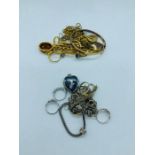 A selection of jewellery to include necklaces, rings etc.