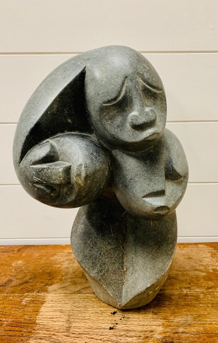 An African three headed sculpture