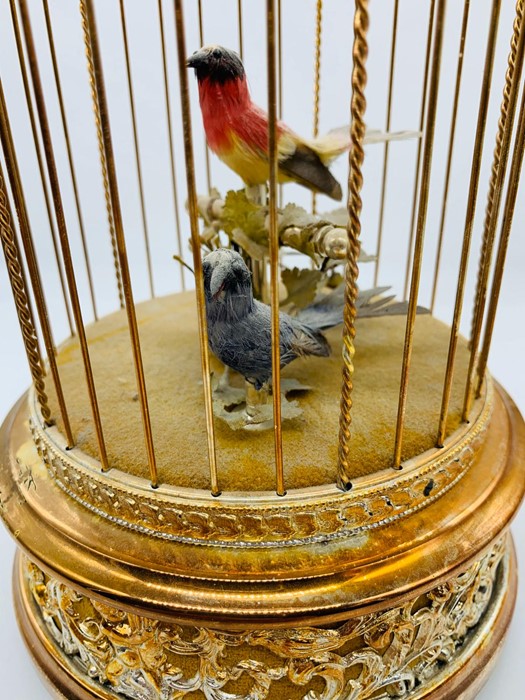 A Reuge music scribe Croix Automator of two song bird in a domed and gilded cage made in Switzerland - Image 2 of 3