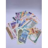 Fifty worldwide uncirculated bank notes