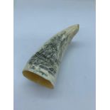 A whales tooth scrimshaw decorated with a sailing ship and a picture of Sir Richard Pearson (H11cm