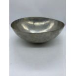 A metal bowl by L. Whitney of Rockport