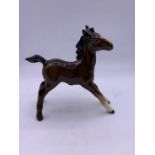 A Beswick figure of a foal