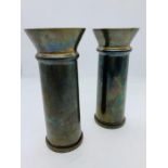 A pair of 1944 shell cases converted into vases