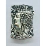 A silver plated vesta case with art nouveau style figure to the decorated case