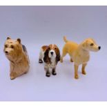 Three Beswick dogs