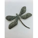 A silver and marcasite dragonfly brooch
