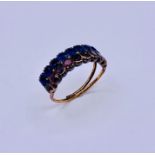 A Cocktail ring with blue and pink stones AF