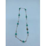 A Jade and Gold necklace