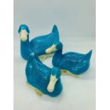 A set of three Chinese turquoise pottery Peking ducks (one AF)