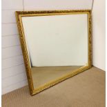 A gilt bevelled mirror