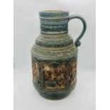 An original West German Jasba jug with medieval panel decoration (36cm tall)