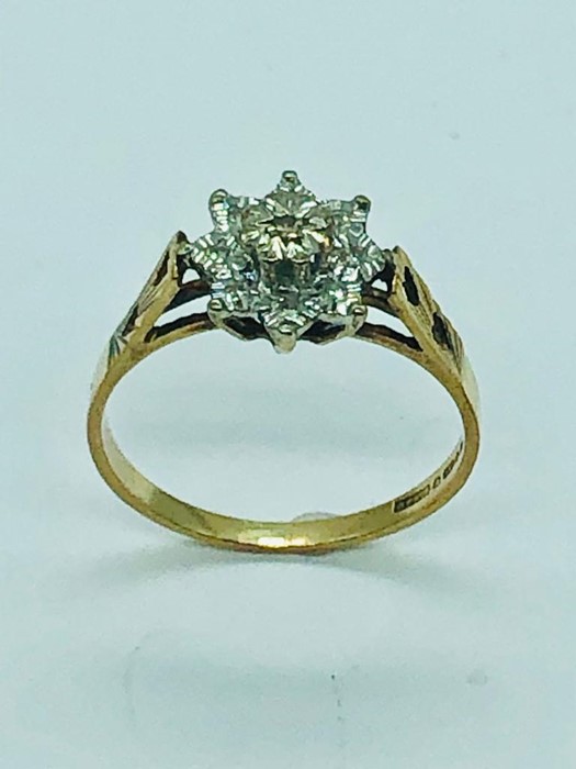 A 9ct yellow gold diamond cluster ring