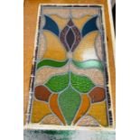A traditional stained glass panel