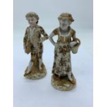 Two small china figurines with gilt detailing
