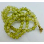 A Set of Jade Prayer Beads.