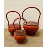 A set of three Chinese rice/nut pails