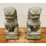 A pair of Foo Dog garden statutes