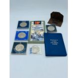 A small selection of coins to include Crowns and presentation packs.