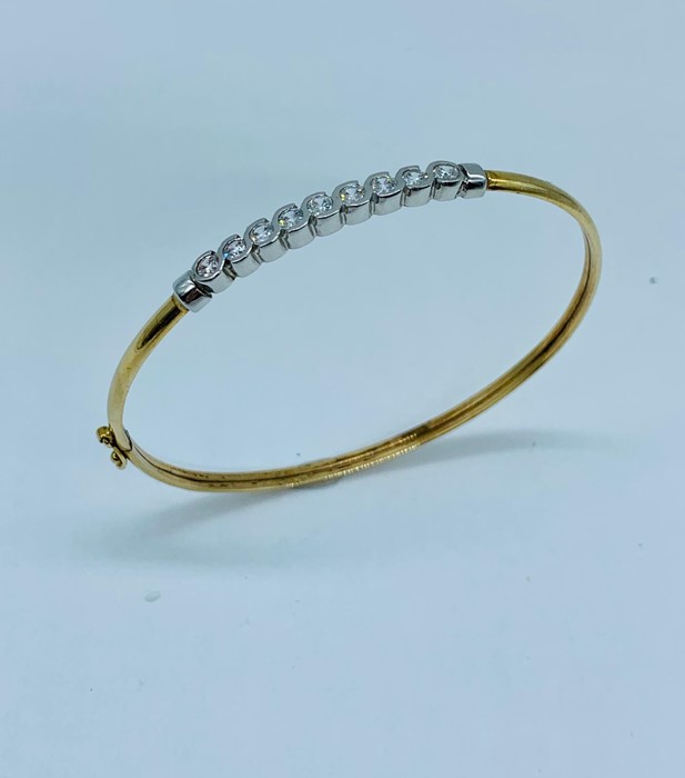 A Persian gold Bracelet with white stones