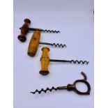 Four Collectable corkscrews.