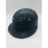 A vintage blue polo hat