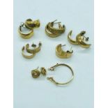 A selection of gold earrings and coin mount (7.4g)