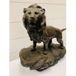 Bronzed figure of a Lion on a Rock (35cm x 40cm)