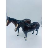 Two Beswick brown horses
