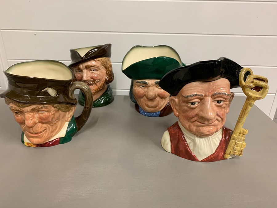 Four Royal Doulton Toby jugs, Toby Philpots, Robin Hood, Goidels and Paddy