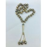 A set of silver prayer beads