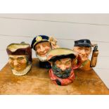 Four Royal Doulton Toby jugs, Falstaff, Golfer, Old Salt and Simon Cellares